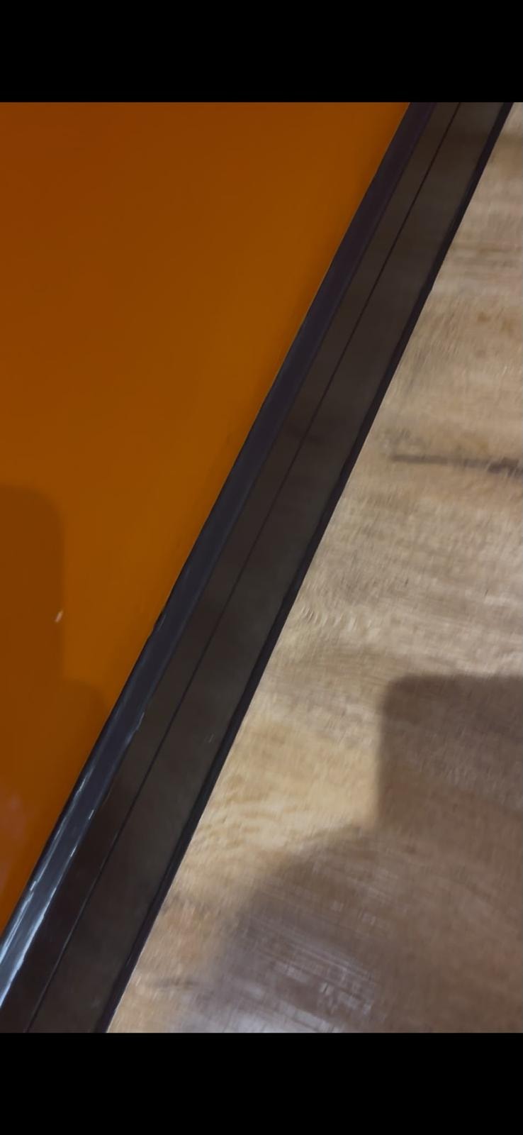 Forever Padel — sealant detail at court glass panel base