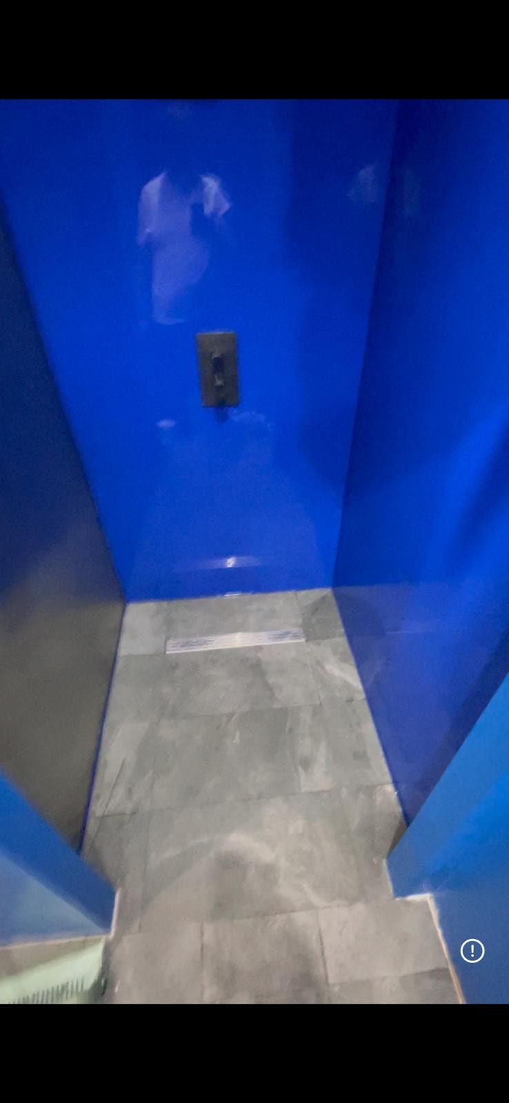 Frame Fitness Studio — blue shower enclosure sealed with Fantastic Blue Rainbow mastic