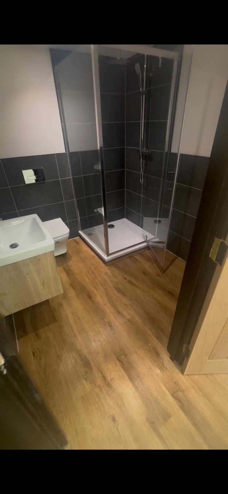 Clean silicone finish on shower tiles